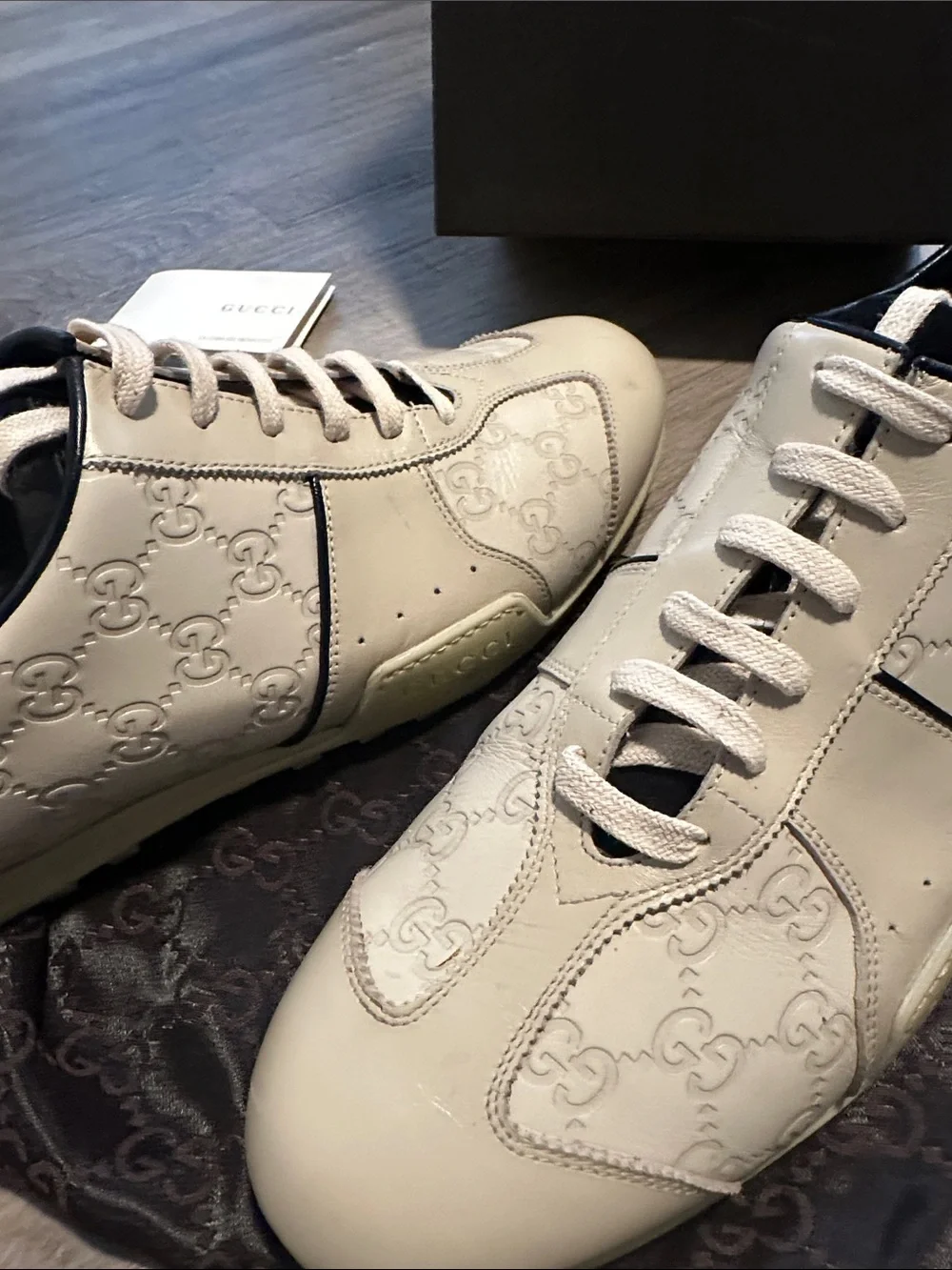 Gucci Men’s Cream Leather Sneakers with Black Accents